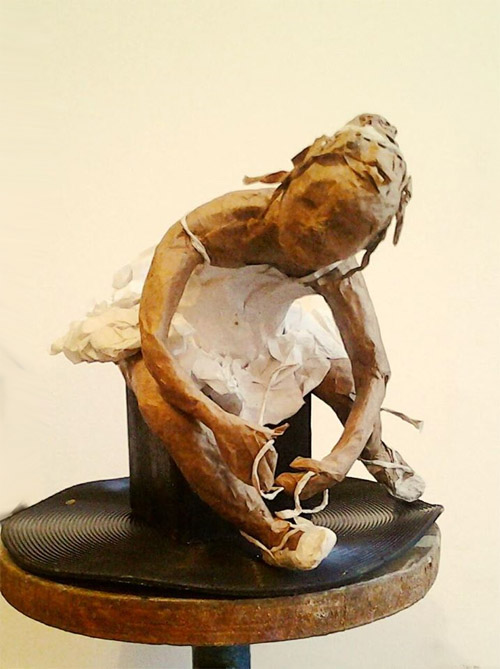 ballet child sitting shoes